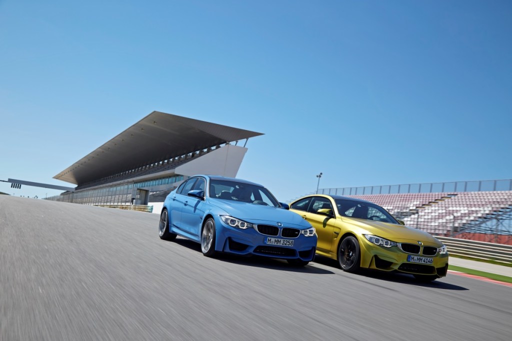 BMW M3 and M4 on a race track