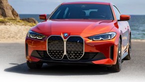 An orange BMW i4.