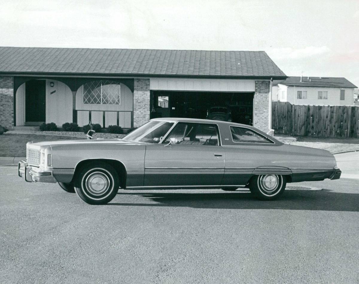 A black and white photo of a Chevy Caprice.