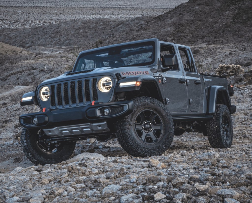 The 2023 Jeep Gladiator crawling over rocks 
