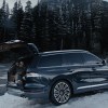 Lincoln sales are pushed forward by all but the Lincoln Aviator, pictured parked in the snow in front of a forest.