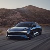 A dark blue Lucid Air Sapphire on a desert road. The Lucid Air Sapphire's price isn't for the faint-hearted.