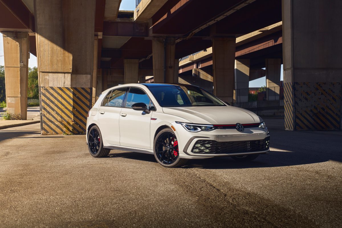 A white 2024 Manual Golf GTI 380 parked under a bridge