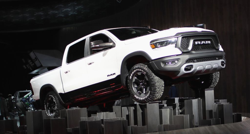White 2020 Ram 1500 pickup truck on black background