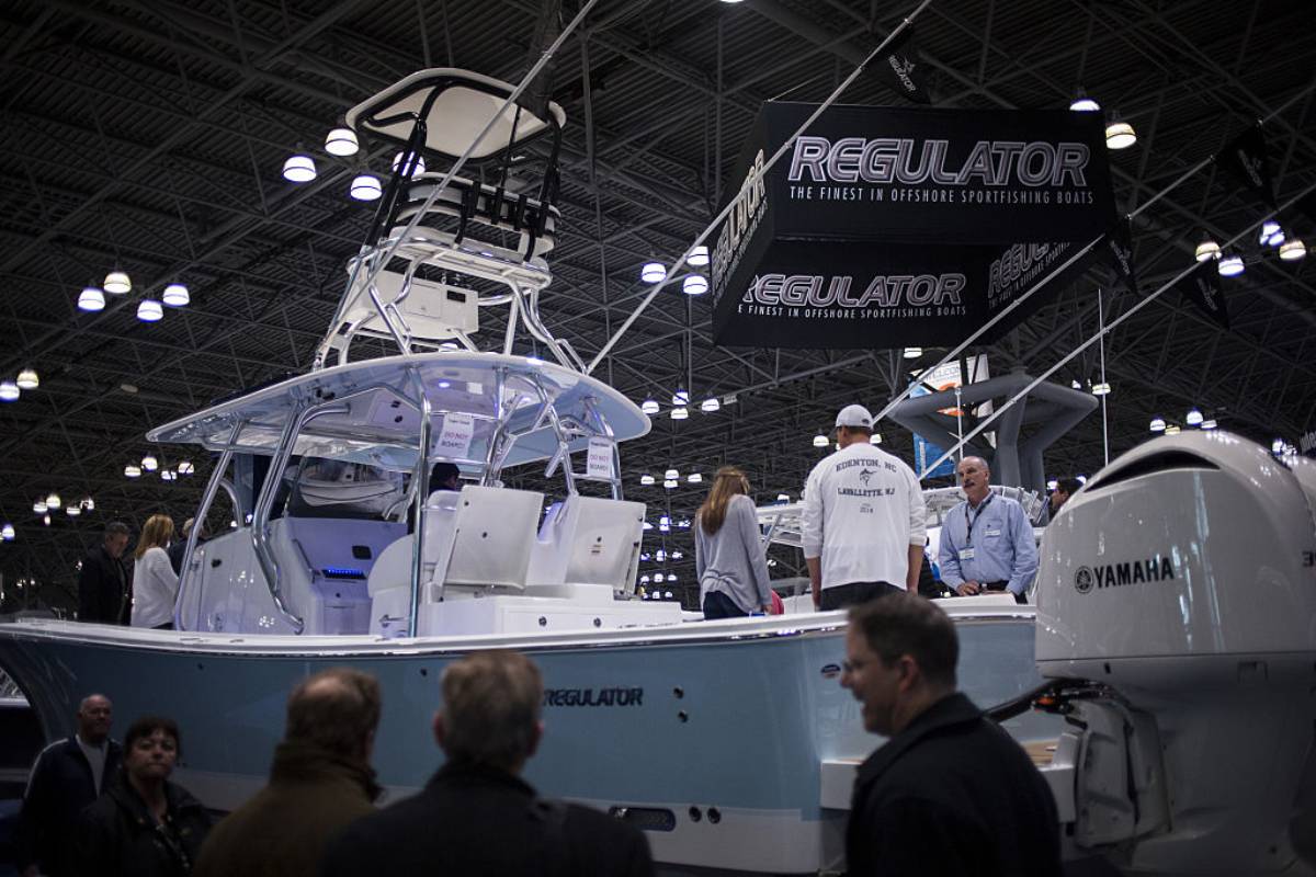 A Regulator fishing boat on display at a boat show.