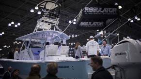 A Regulator fishing boat on display at a boat show.
