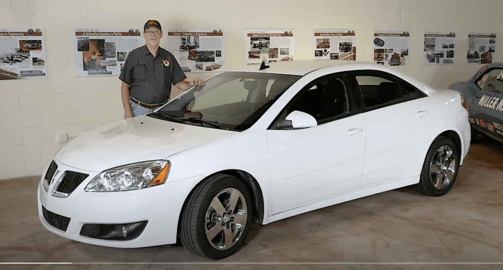 Pontiac Transportation Museum Executive Director Tim Dye with last Pontiac made
