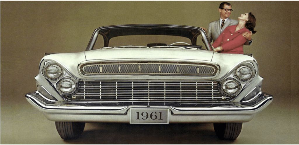 White 1961 Desoto with two models