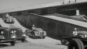 WW2 Toyota trucks driving off the line in the 1940s