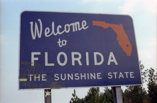 Why Do So Many Semi-Trucks Have Florida License Plates?