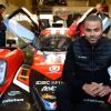 Former San Antonio Spurs basketball player Tony Parker poses in front of an Oreca 07 Gibson LMP2 car. Tony Parker's car collection is extensive.