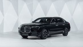 A promotional shot of the new 2024 BMW i7 xDriver60 Protection all-electric full-size luxury sedan model