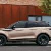 An exterior side profile of a 2024 Land Rover Range Rover Evoque subcompact luxury SUV model