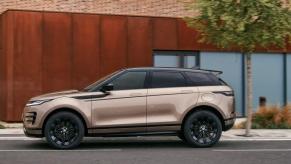 An exterior side profile of a 2024 Land Rover Range Rover Evoque subcompact luxury SUV model
