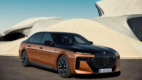 A two-tone BMW i7 M70 performance-focused all-electric full-size luxury car model based on the 7 Series