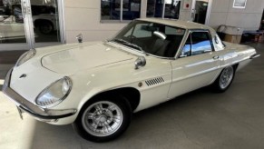 White 1968 Mazda Cosmo Sport in showroom