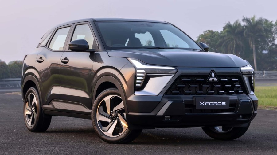 Charcoal gray 2024 Mitsubishi Xforce compact SUV at sunset