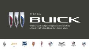 A banner commemorating the new Buick tri-shield logo design and the history of the brand's badging