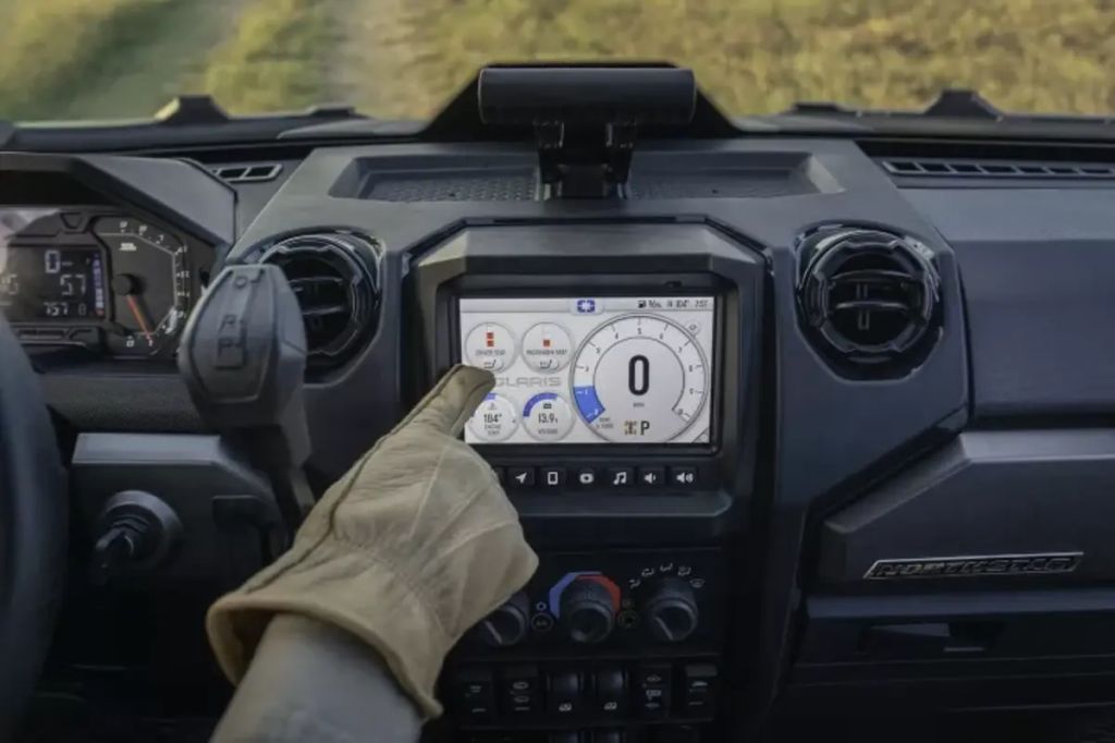 2024 Polaris Ranger XD 1500 Side-by-Side with gloved hand on screen