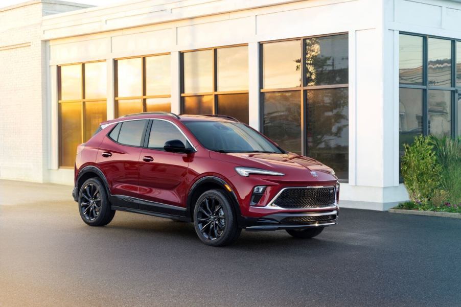 The 2024 Buick Encore GX Sport Touring subcompact SUV model in Cinnabar Metallic