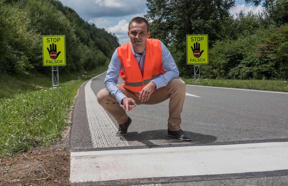 Inventor of one-sided rumble strips, Konstantin Berkovych, showing their implementation on German roads