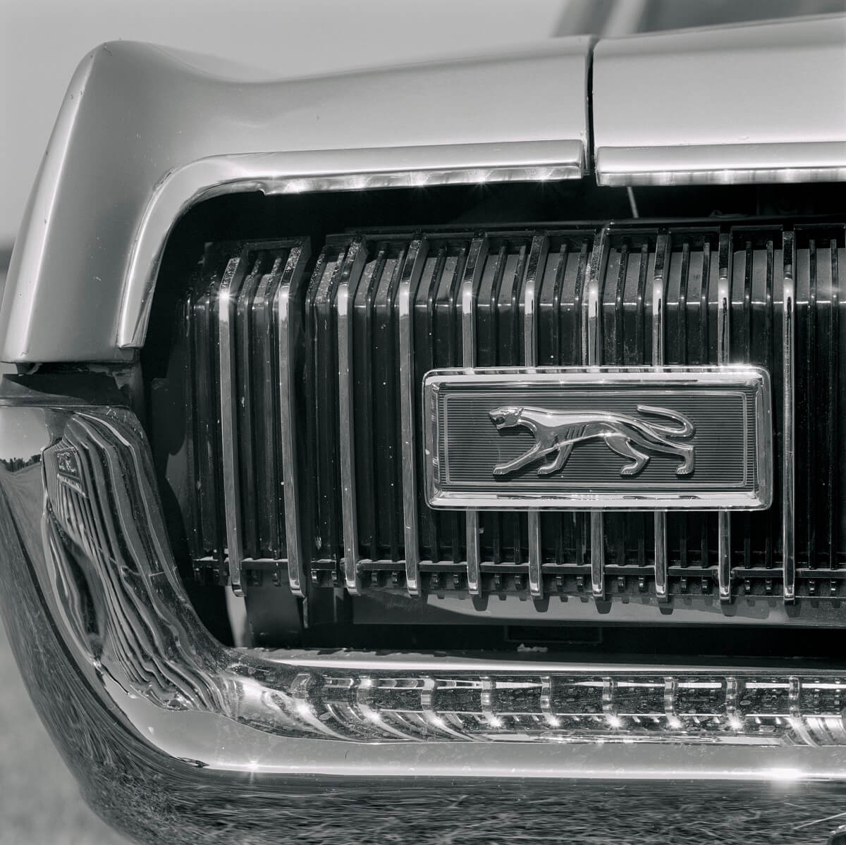 A 1967 Mercury Cougar XR-7 shows off its badge and hideaway headlight.