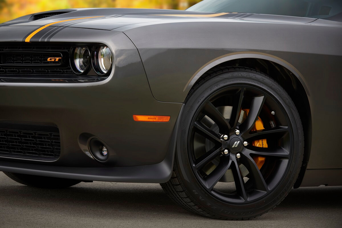 A gray Challenger shows off its black wheels, which, along with AWD, makes it one of the best road trip cars in the segment.