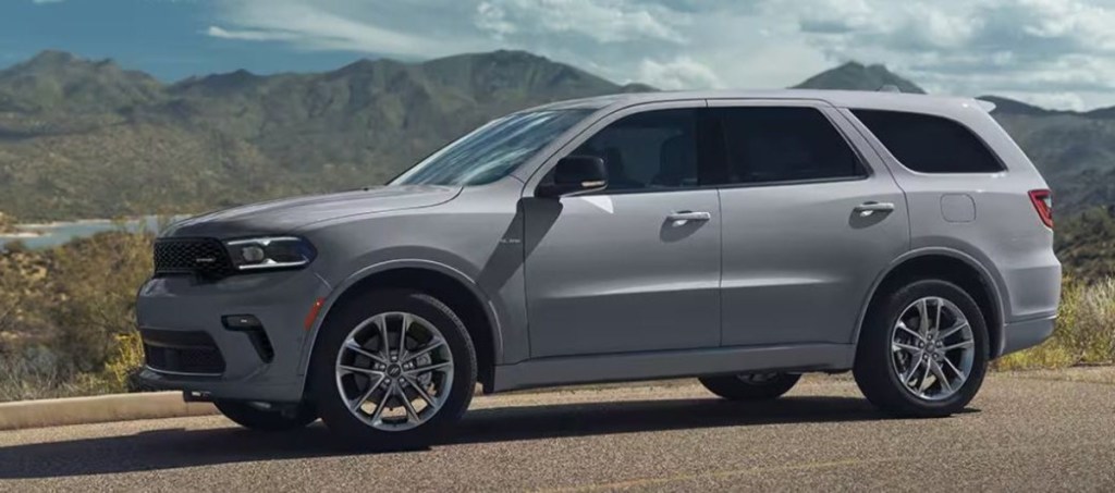 Gray 2023 Dodge Durango SUV in front of building
