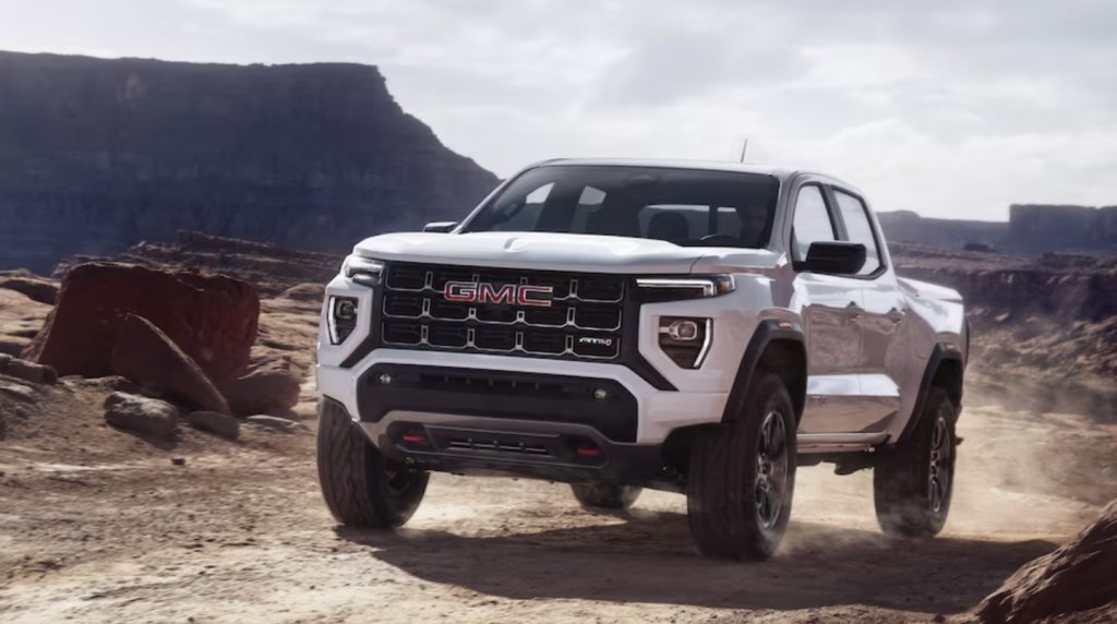The 2023 GMC Canyon AT4 off-roading in sand