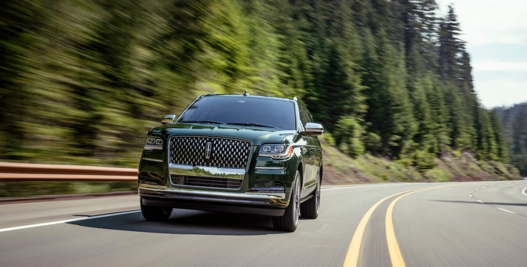 A 2023 Lincoln Navigator drives down the road.