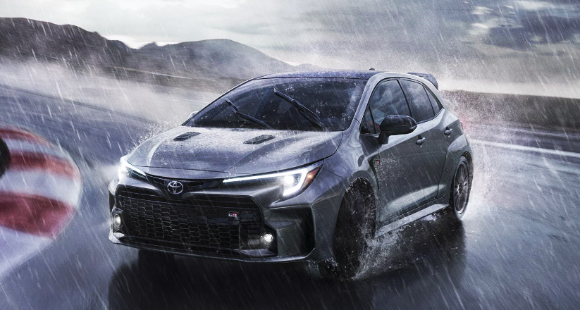 The 2023 Toyota GR Corolla drifting around a curve