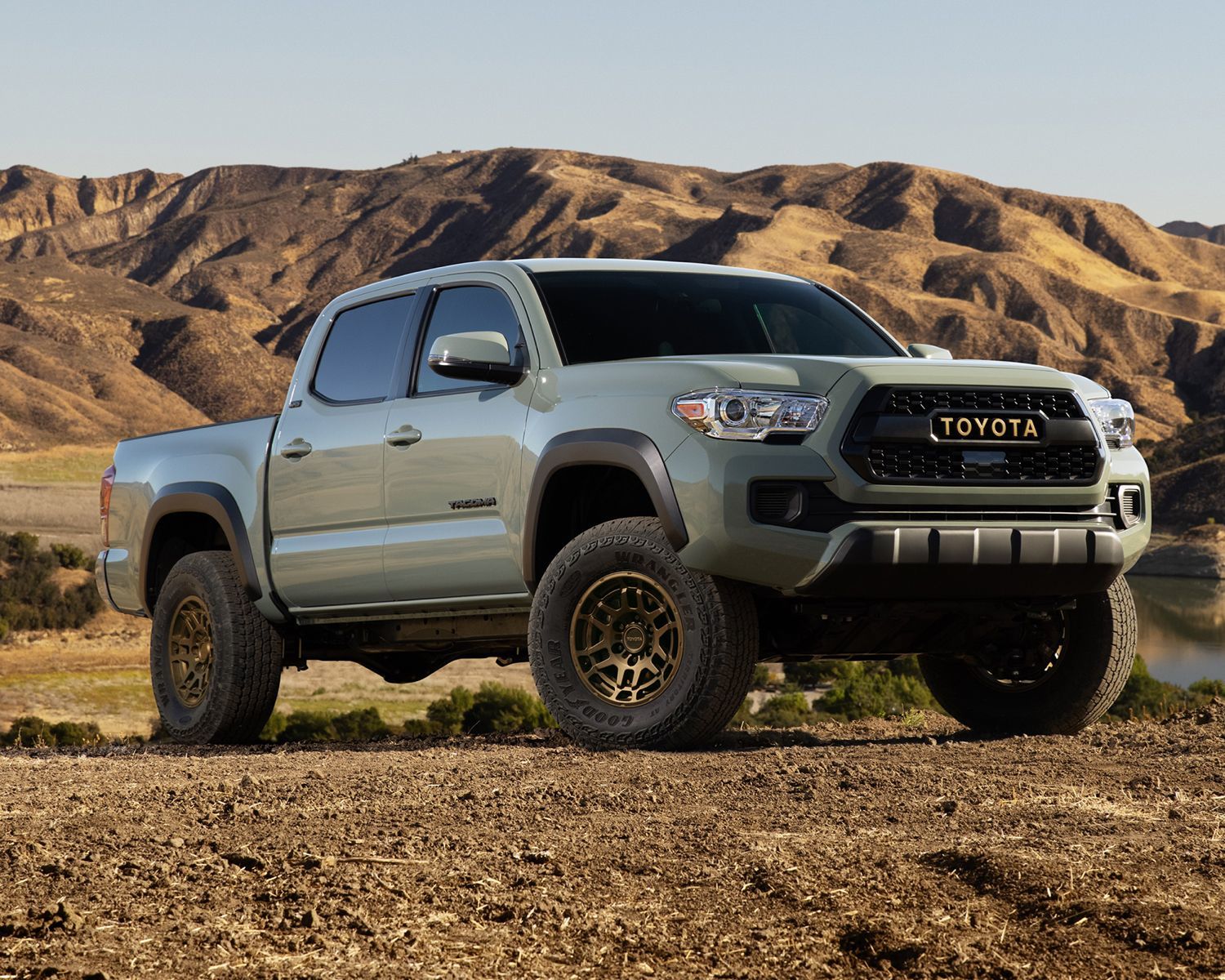 The 2023 Toyota Tacoma parked in the desert sand