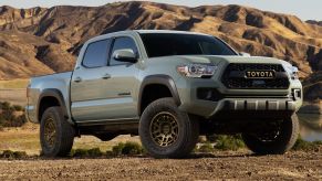 The 2023 Toyota Tacoma parked in the desert sand