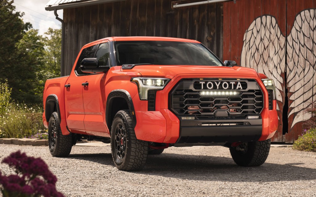 The 2023 Toyota Tundra parked near a building