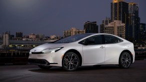 The 2023 Toyota Prius parked in the city at night