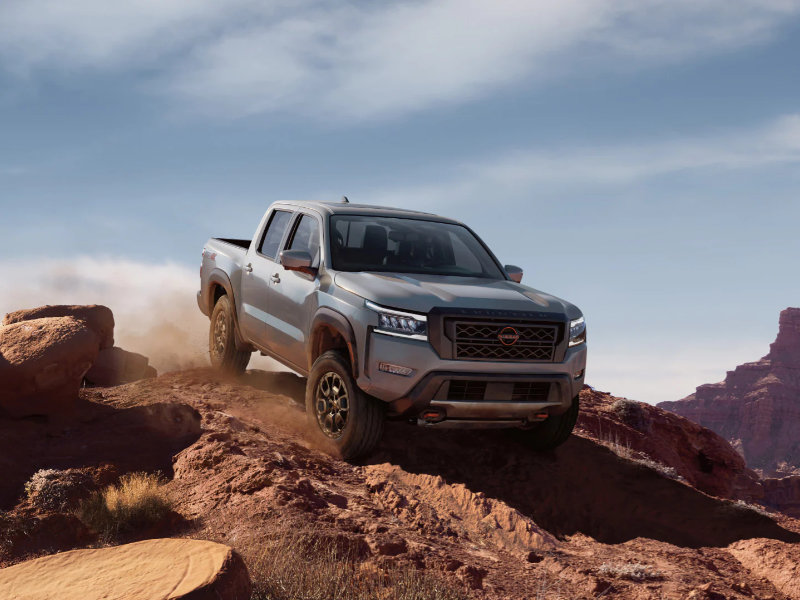 The 2023 Nissan Frontier off-roading in sand