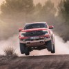 The 2024 Ford Ranger Raptor jumping in the dirt