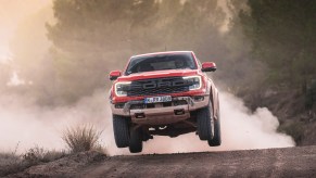 The 2024 Ford Ranger Raptor jumping in the dirt