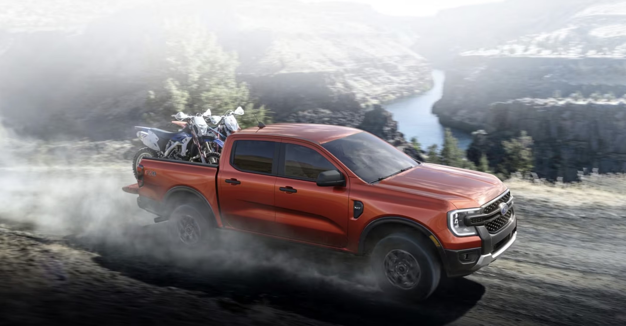 The 2024 Ford Ranger with dirt bikes in the bed