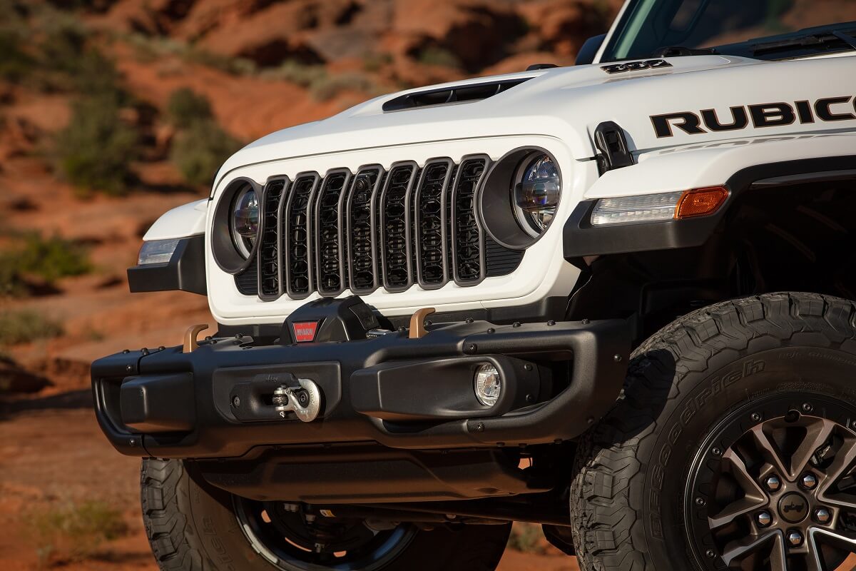 A white 2024 Jeep Wrangler Rubicon 392 shows off its revised grille.