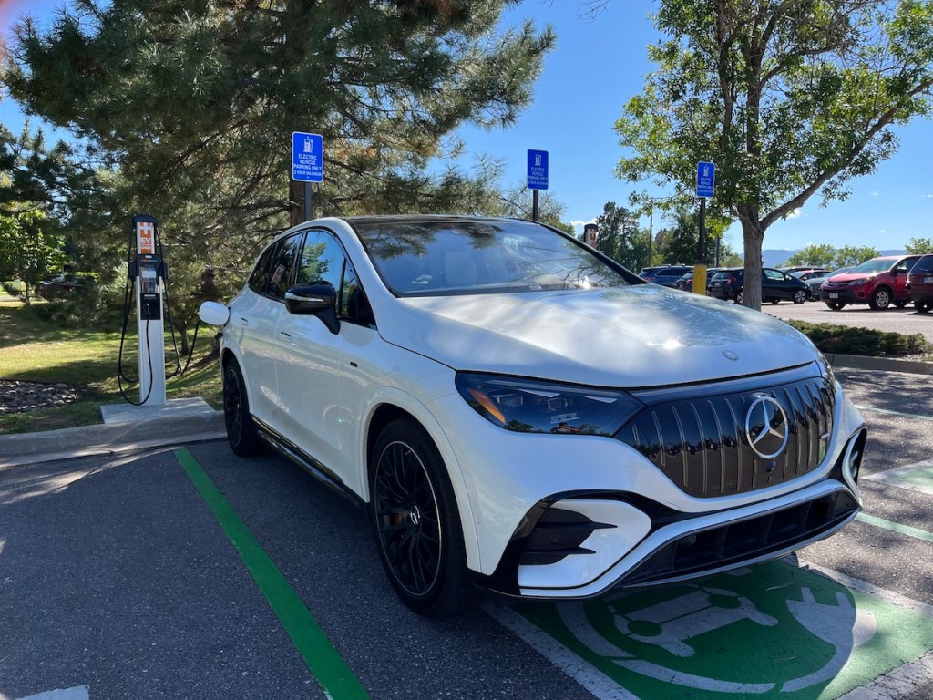 The 2024 Mercedes-Benz EQE charging at a station