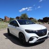 A front corner view of the 2024 Mercedes-EQE AMG
