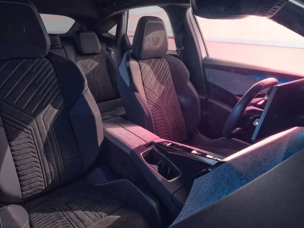 The seats of the 2024 Peugeot E-3008 EV SUV look back