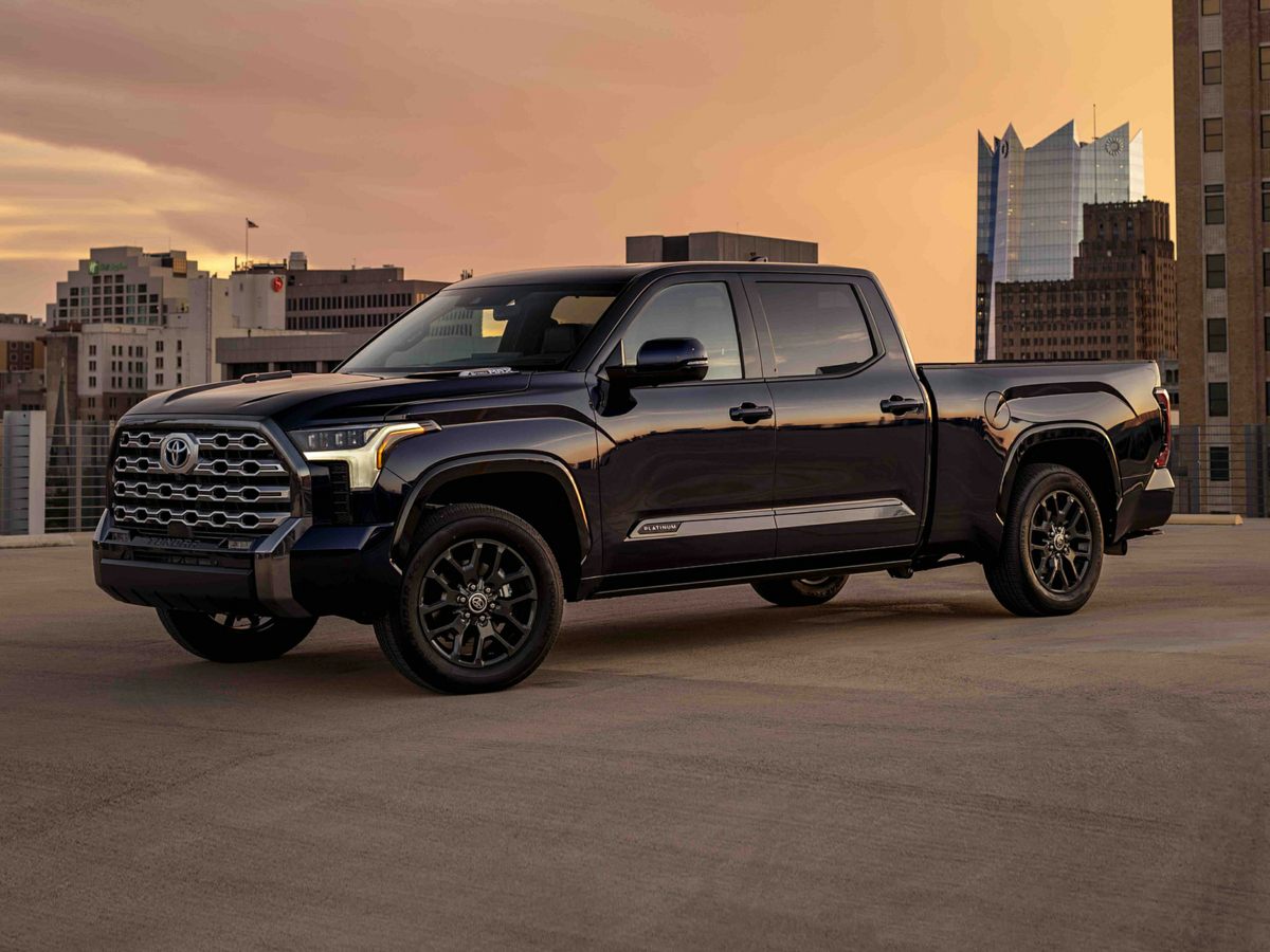 The 2024 Toyota Tundra parked in front of a city skyline