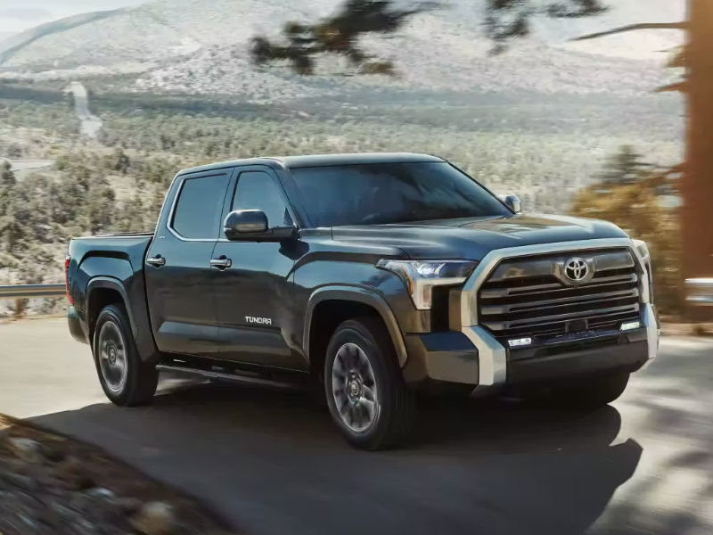 The 2024 Toyota Tundra driving down the road