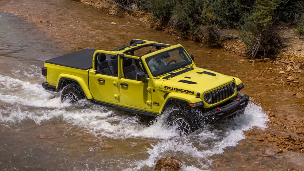 The 2024 Jeep Gladiator off-roading through water