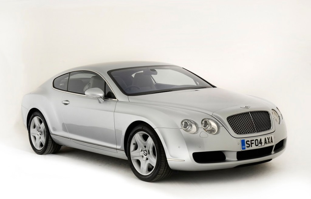 A first-generation Bentley Continental GT shows off its silver paintwork.