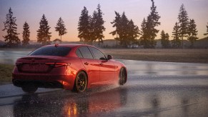 BMW driving through heavy standing water to demonstrate the abilities of the Bridgestone Potenza Sport AS tires