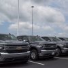 An Ohio lot around Cincinnati or Cleveland shows off its supply of pickup trucks.