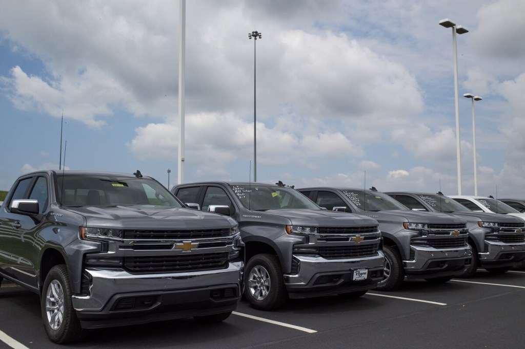 An Ohio lot around Cincinnati or Cleveland shows off its supply of pickup trucks.